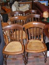 A set of six dining chairs with bobbin backs and c