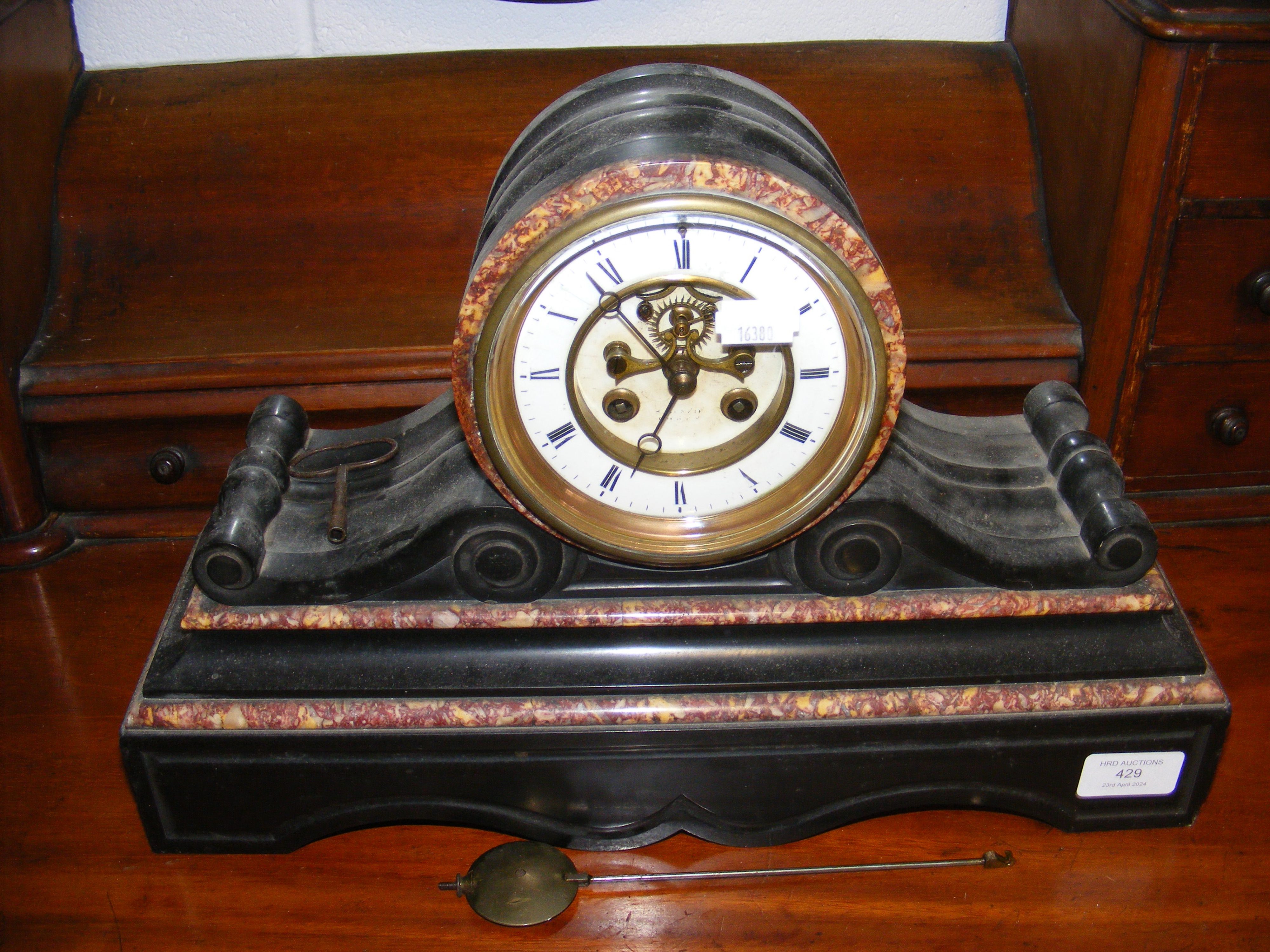 A Victorian slate mantel clock