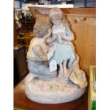 A large continental porcelain figural statue of bo