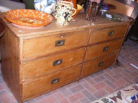 A pine sideboard with six short drawers - length