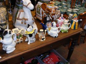 A collection of novelty teapots, including 'The Ma
