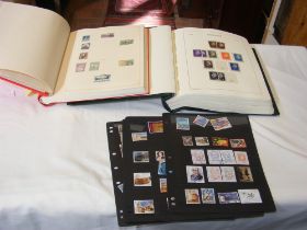 A collection of Greek stamps in two albums