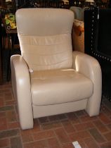 A John Lewis adjustable lounge armchair upholstered in ivory