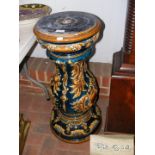 A Victorian Majolica jardiniere stand with impress