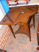 An antique envelope games table with single drawer