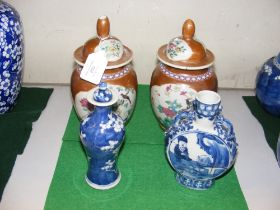 A pair of Chinese vase and covers with character m