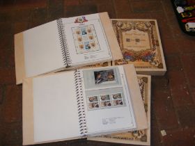 Three stamp albums entitled 'The Royal Wedding HRH