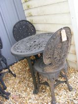 A Victorian style black plastic circular garden ta