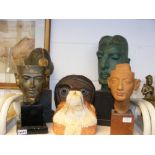 A sculpted head on plinth, together with other orn