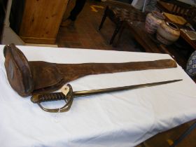 An antique sword with pierced guard and wooden gri