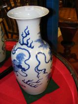 An antique Chinese blue and white vase with stylis