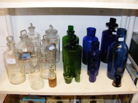 Assorted vintage Chemist's bottles, including gree