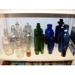 Assorted vintage Chemist's bottles, including gree