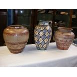 Two vintage decorated terracotta vases together wi