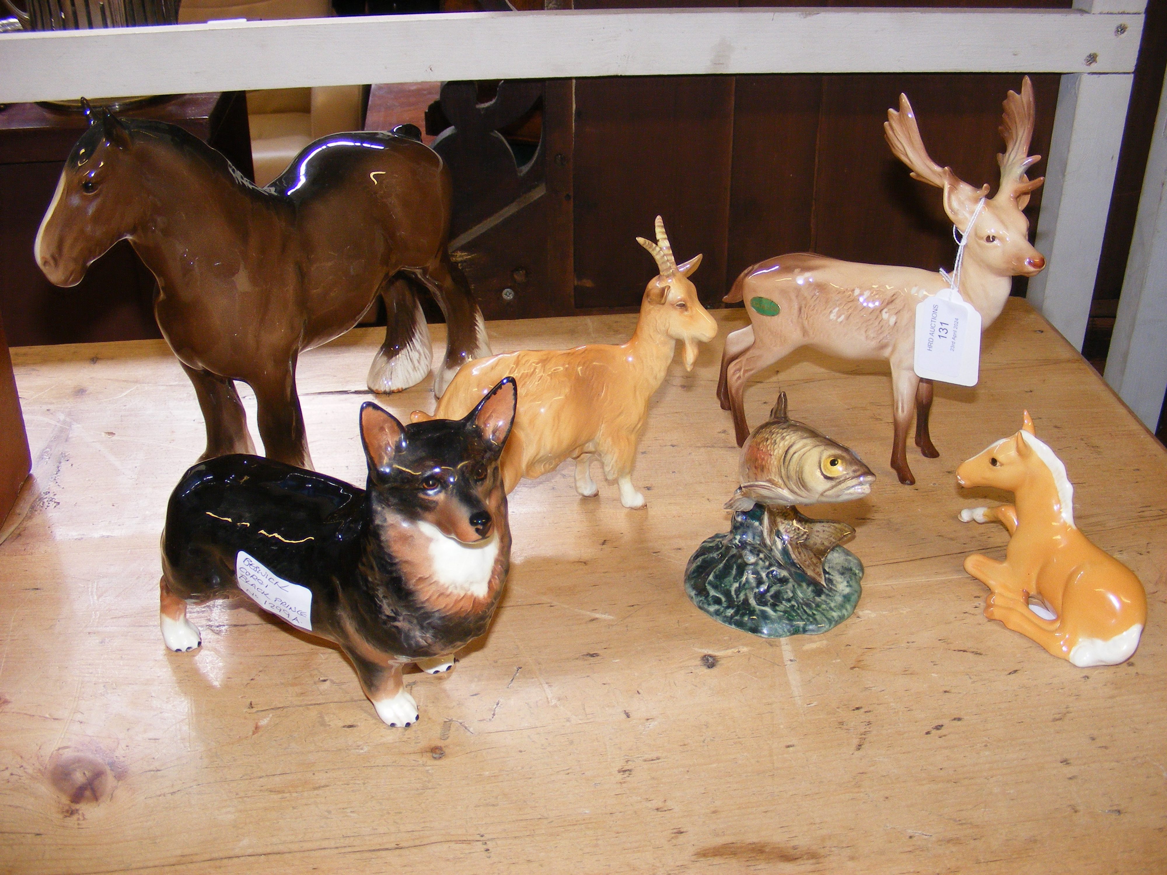 Six pieces of Beswick including a corgi