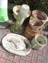 An Isle of Wight birdbath, together with garden ur