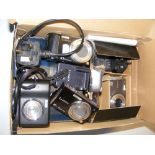 A quantity of old digital cameras and accessories