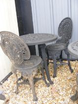 A Victorian style black plastic circular garden ta