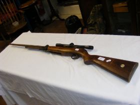 A Webley air rifle with BSA telescopic sight