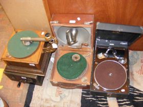 Three picnic gramophones and a partial gramophone