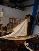 A model gaff rigged yacht on stand - length of hul