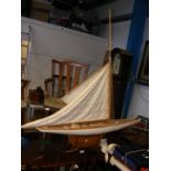 A model gaff rigged yacht on stand - length of hul