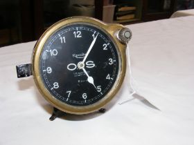 A Ripaults French dashboard clock with brass rim