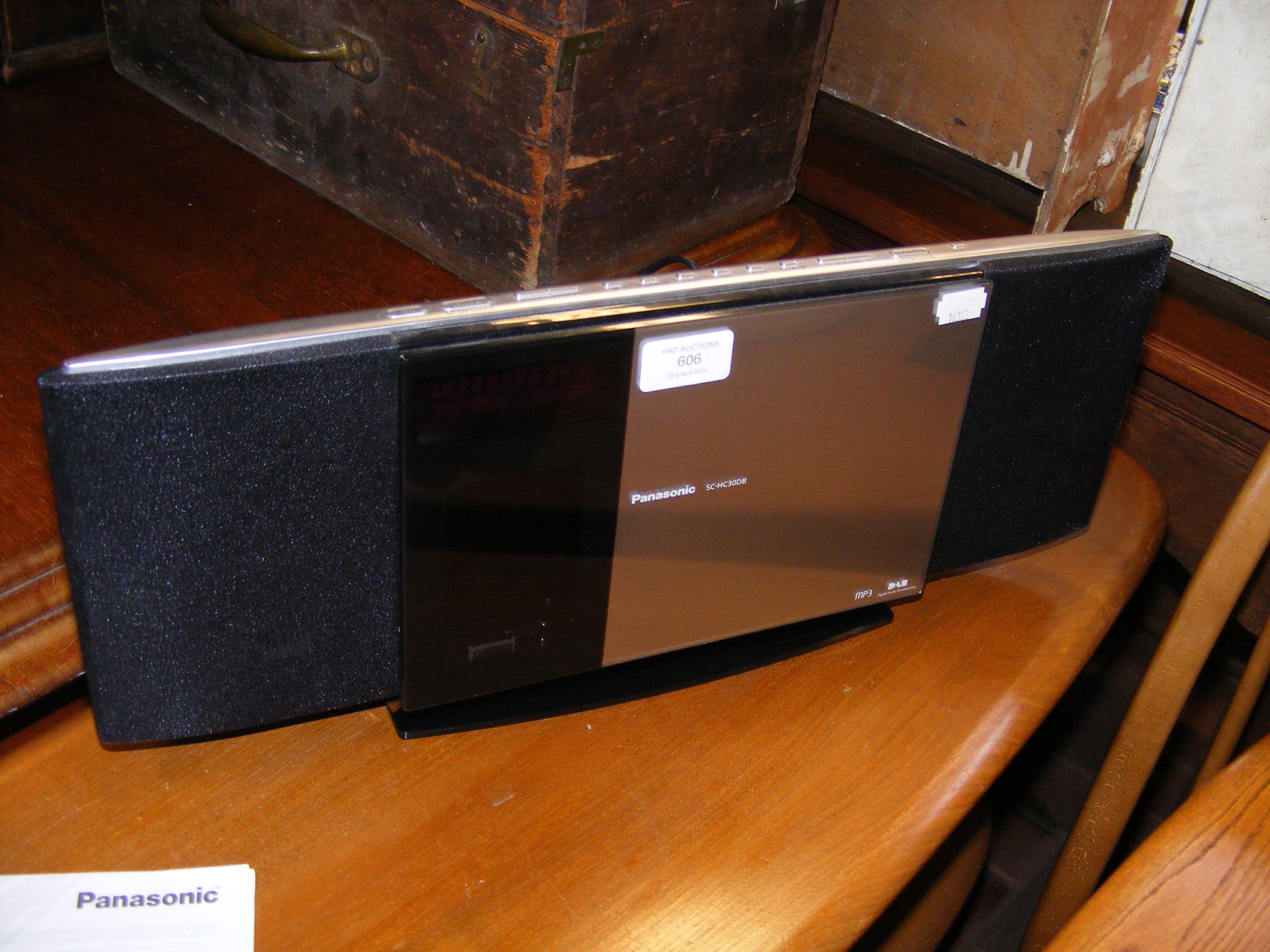 A Panasonic SC-HC30DB Compact Stereo System with o