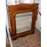 A Victorian walnut pier cabinet with gilt beading