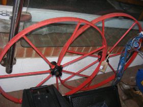 Two metal cart/wagon wheels - painted red and blac