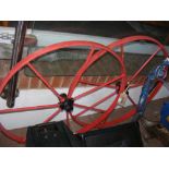 Two metal cart/wagon wheels - painted red and blac