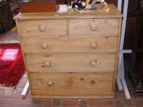 A pine chest of two short and three long drawers -
