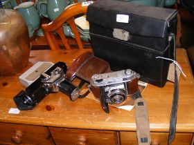 A quantity of vintage optical equipment, including
