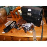 A quantity of vintage optical equipment, including