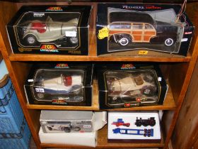 Boxed die cast model vehicles, including Burago an