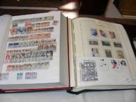 Two albums containing France and Netherlands stamp
