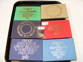 An 1890 silver crown, assorted loose GB and USA coinage and six various Royal Mint coin sets