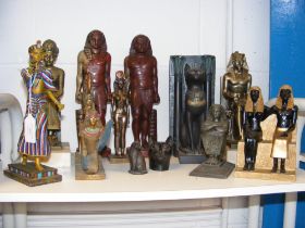 A quantity of Egyptian themed statues and ornament