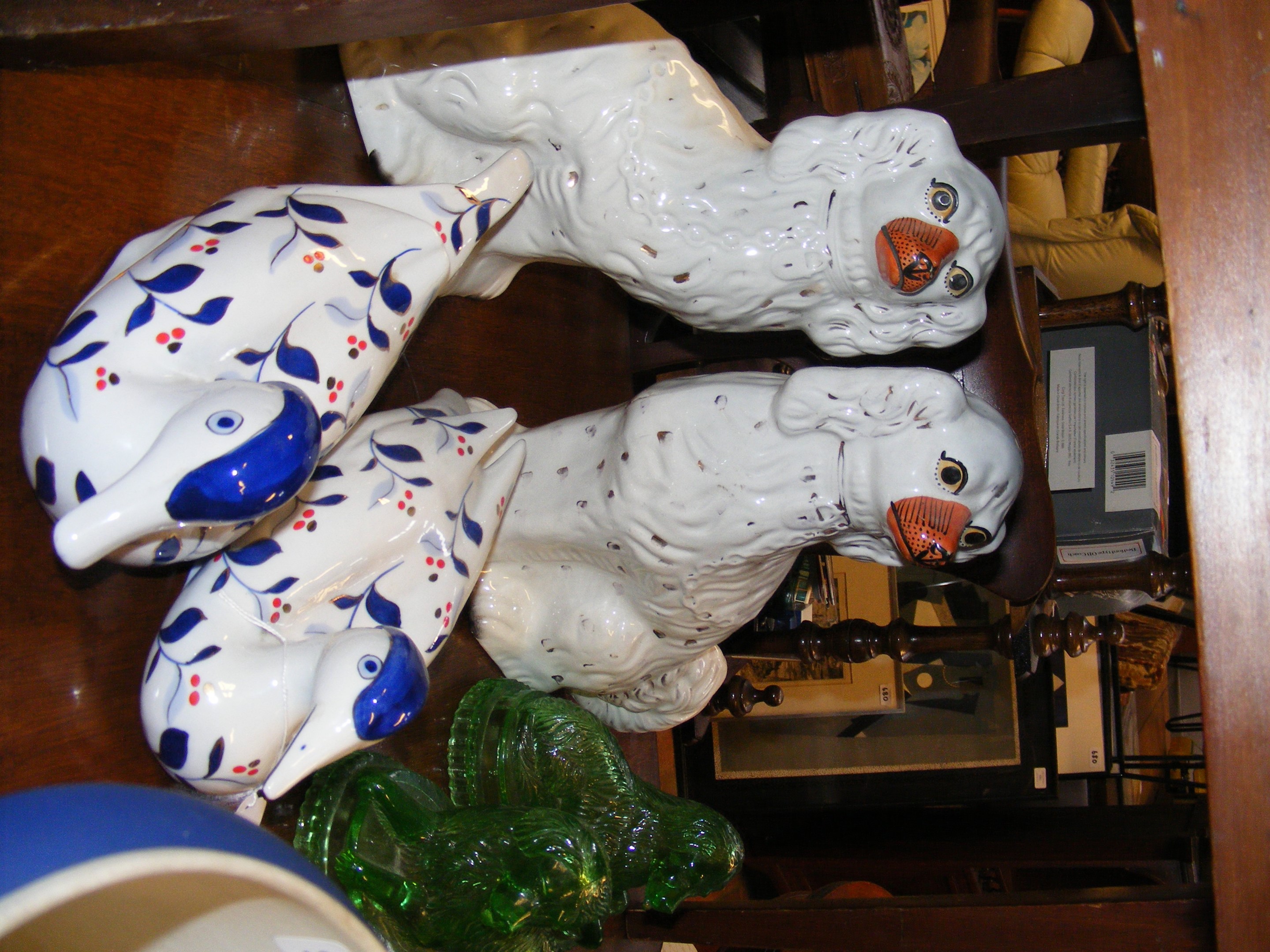 A pair of Staffordshire mantel dogs, a pair of Chi