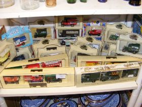 A collection of boxed die cast model vehicles, inc