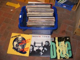 A box of vinyl LP records