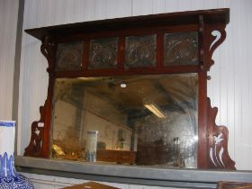 An Arts & Crafts style mahogany overmantel mirror