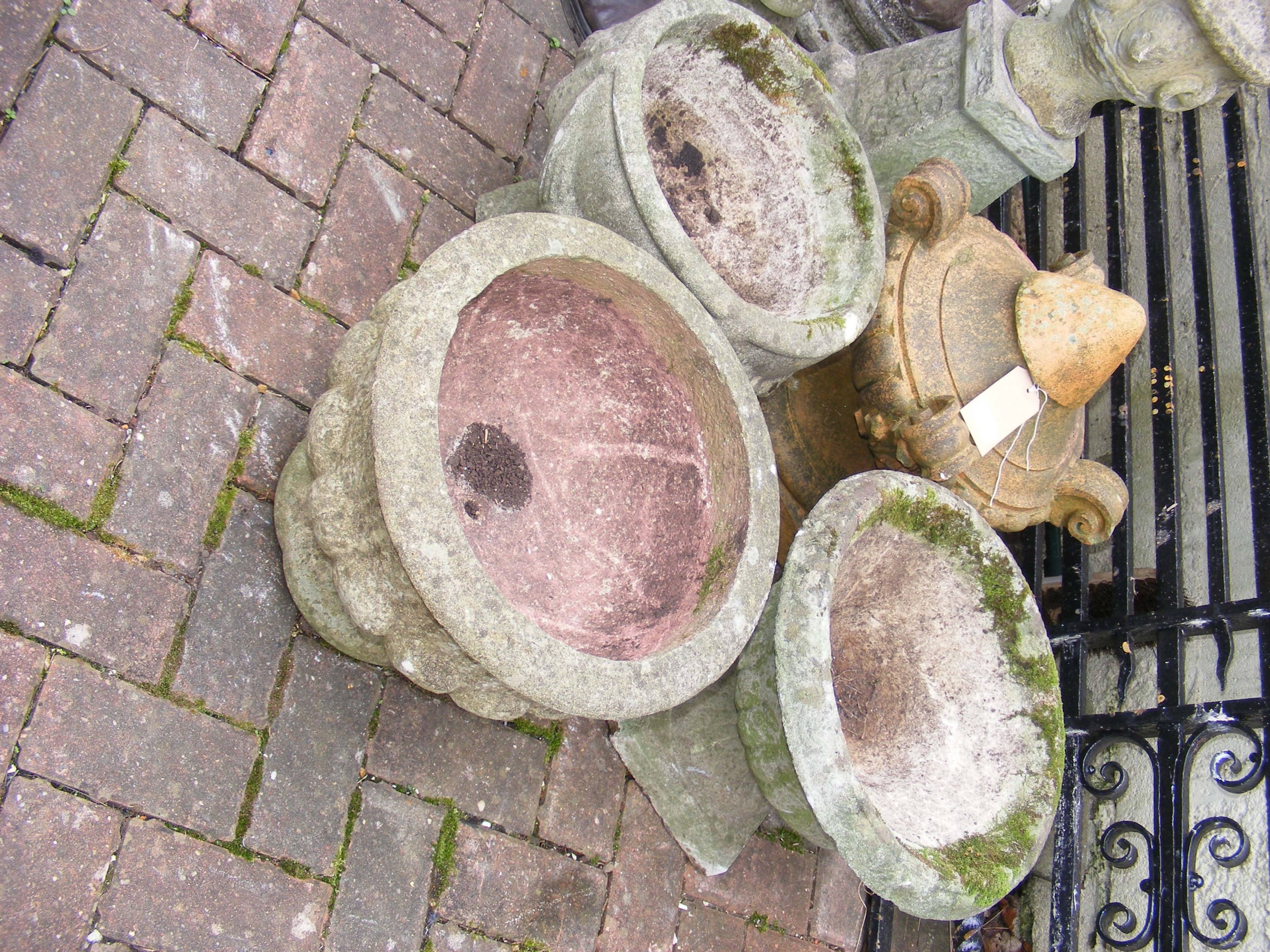 Three garden urns and a terracotta garden ornament