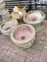 Three garden urns and a terracotta garden ornament