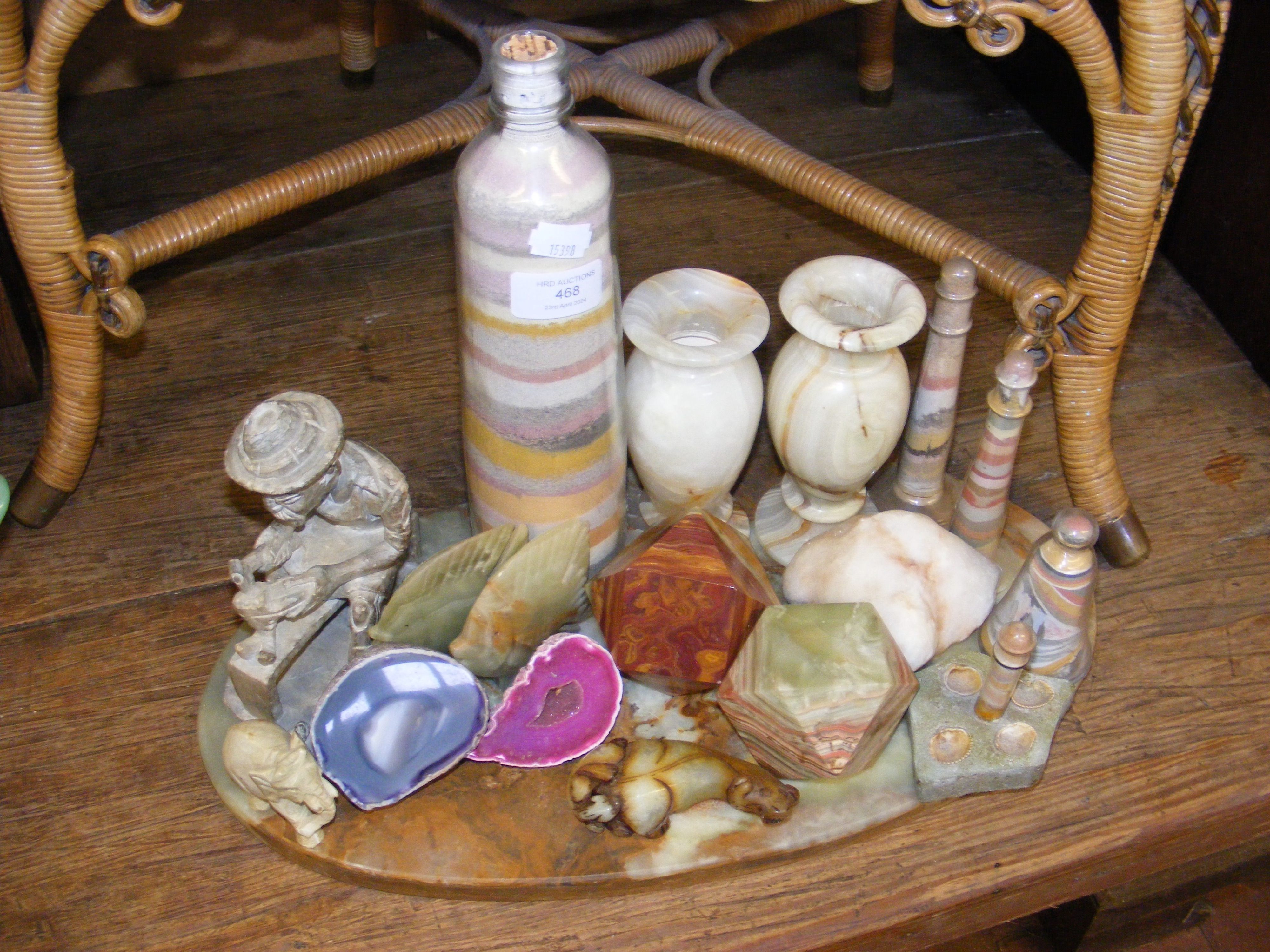 A collection of stone and sand ornaments