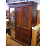 A large antique mahogany wardrobe with full length