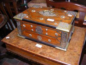 A decorative wooden box with Middle Eastern style