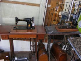 Two Singer sewing machine tables and one other sew