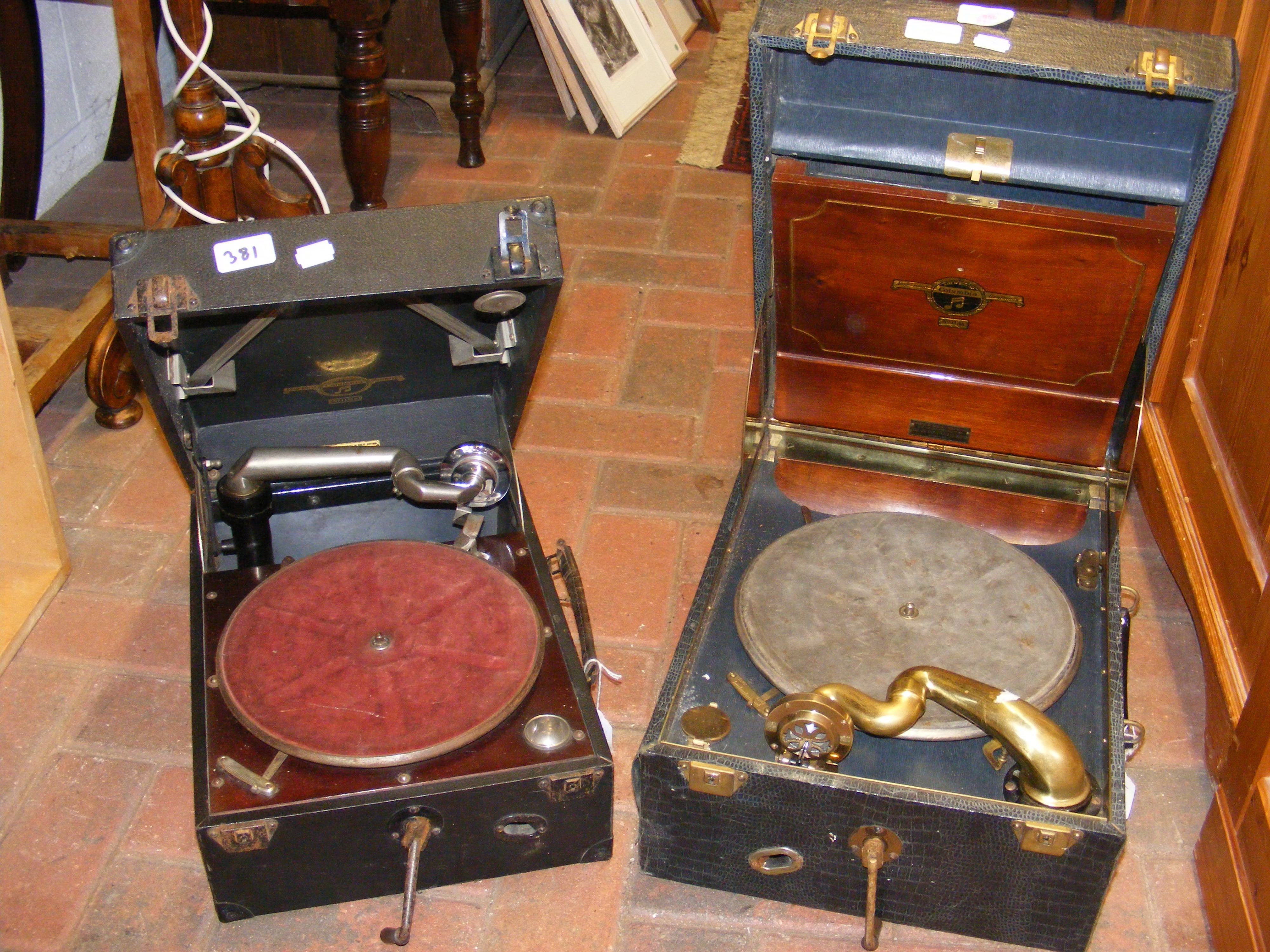 Two vintage Columbia portable wind up gramophones