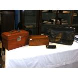 A walnut box, leather satchel, leather bowls case